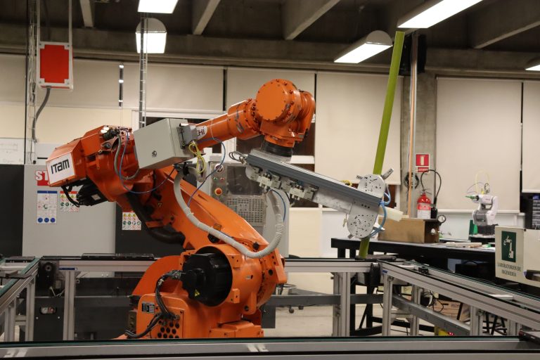 Robotic arm assembling medical devices in a sterile environment