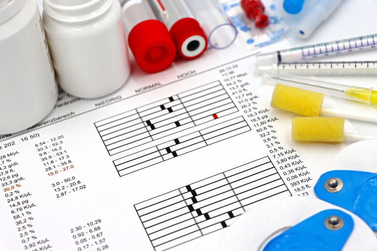 Arrangement of medical equipment, lab tests, and health data on a clinical table