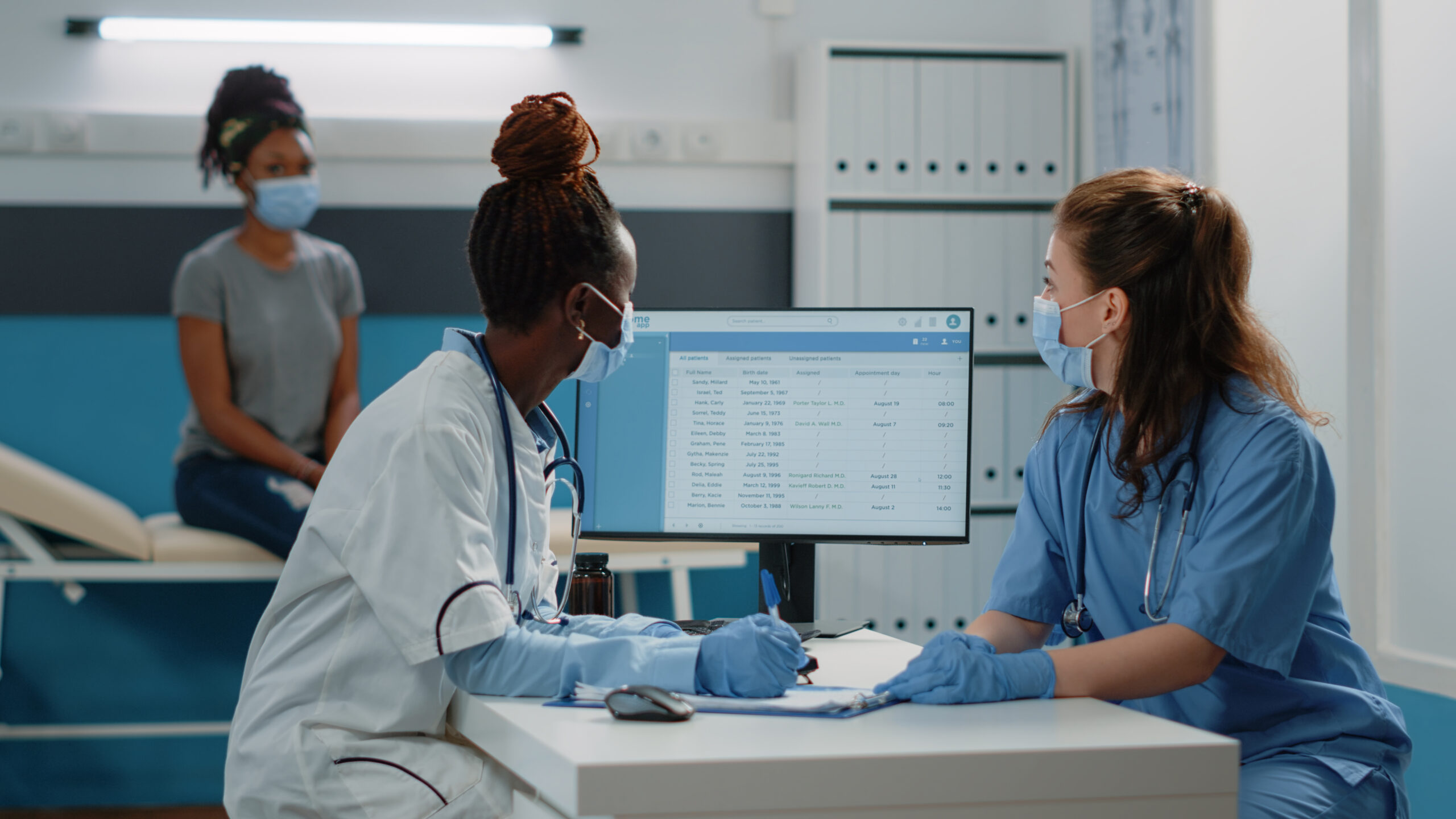 Team of doctor and nurse preparing prescription paper