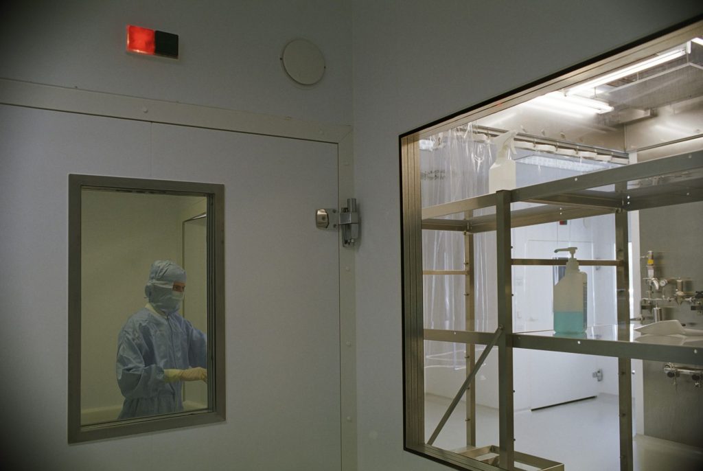 Advanced medical device components being assembled in a cleanroom