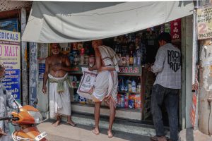 Local shoppers visit a small neighborhood shop in Tiruchirappalli, Tamil Nadu, India